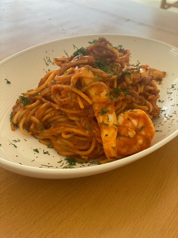 Seafood pasta in red sauce